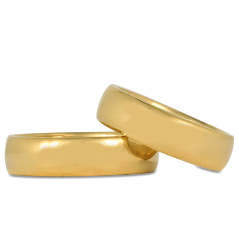 A pair of custom wedding rings, crafted in pure 24K gold!
