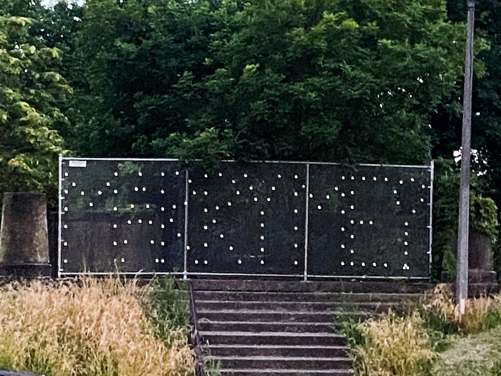 I took idea of a lock bridge, and put my own little twist on it — spelling out "Marry Me" in padlocks!