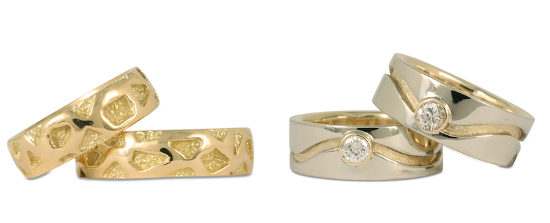 Two pairs of matching wedding rings, one set had diamonds. Your gay/lgbtq+ wedding rings can match, or not!